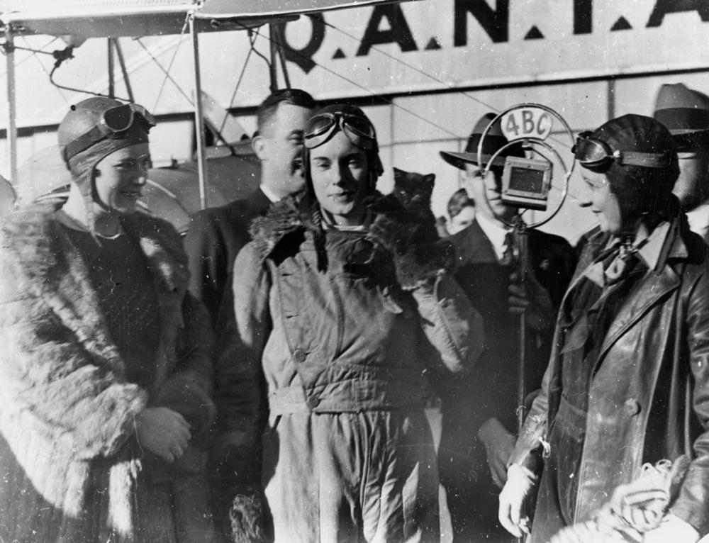 Aviatrix Jean Batten being interviewed after her flight from England to Australia, 1934. (3193274724)