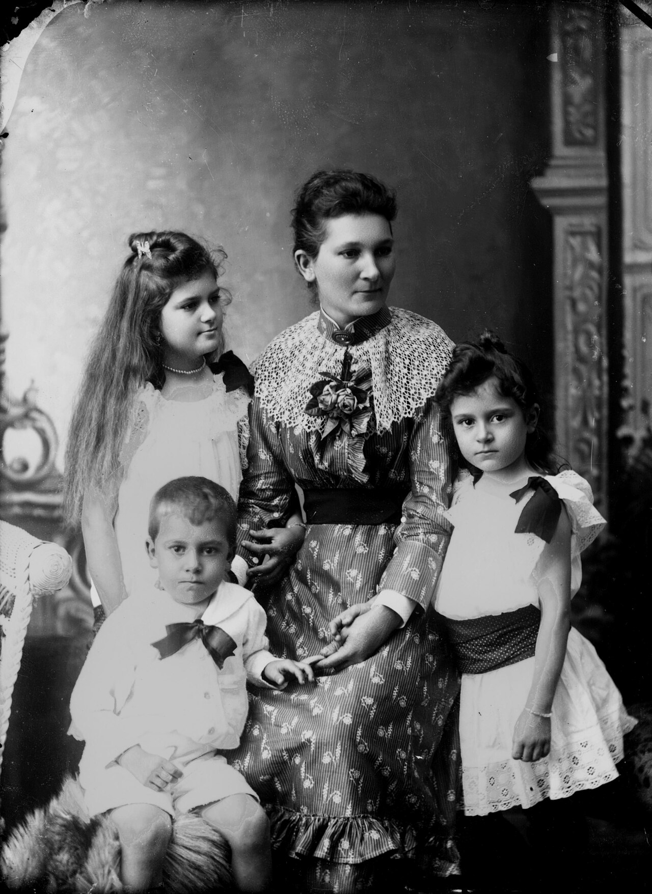 Studio portrait of a mother and her three children, 1890s (4585009957)